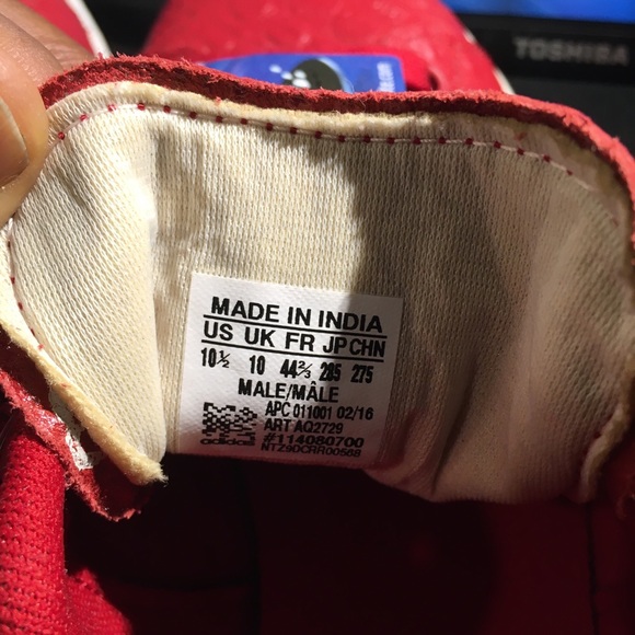 Size 10 1/2 red adidas brand new never used